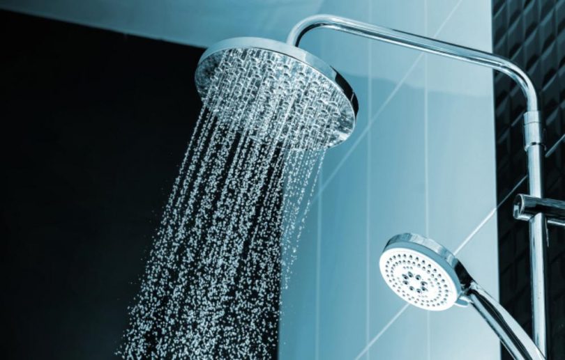 how to remove the flow restrictor from a shower head