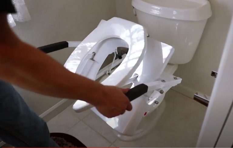 Install Mechanical toilet seat lift with handles - Mount the motor