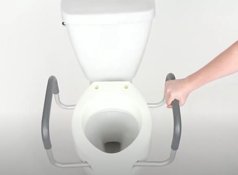 Install Toilet riser with handles - turn the handle sides up and align its holes
