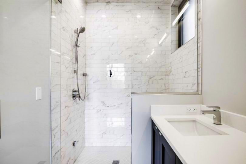 quartz shower walls pros and cons